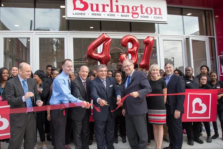 Fred Hand, Chief Customer officer Burlington Stores, cutting the ribbon, and David Coder, Executive Vice President of Stores, right of man cutting ribbon, at the grand opening of the new Burlington Store at 833 Market Street, in Philadelphia, Sept. 22, 2017.  Burlington ranks 459 on the Fortune 500 list.