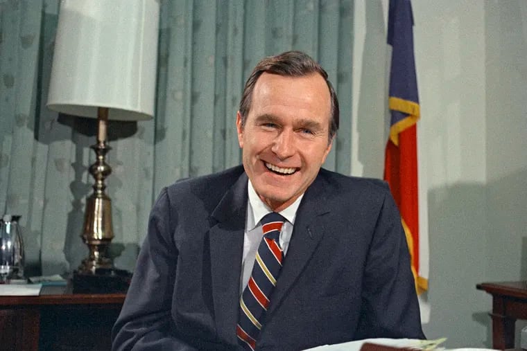 In this Dec. 18, 1970, file photo, newly appointed United Nations Ambassador George H.W. Bush smiles. Bush has died at age 94. Family spokesman Jim McGrath says Bush died shortly after 10 p.m. Friday, Nov. 30, 2018, about eight months after the death of his wife, Barbara Bush.