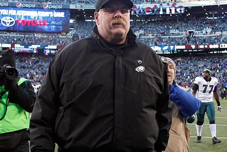The Eagles' Andy Reid walks off the field at the end of the game. (Ron Cortes/Staff Photographer)