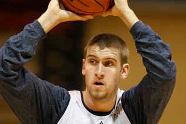 Coach Doug Collins refers to Spencer Hawes as 'ball-friendly.'