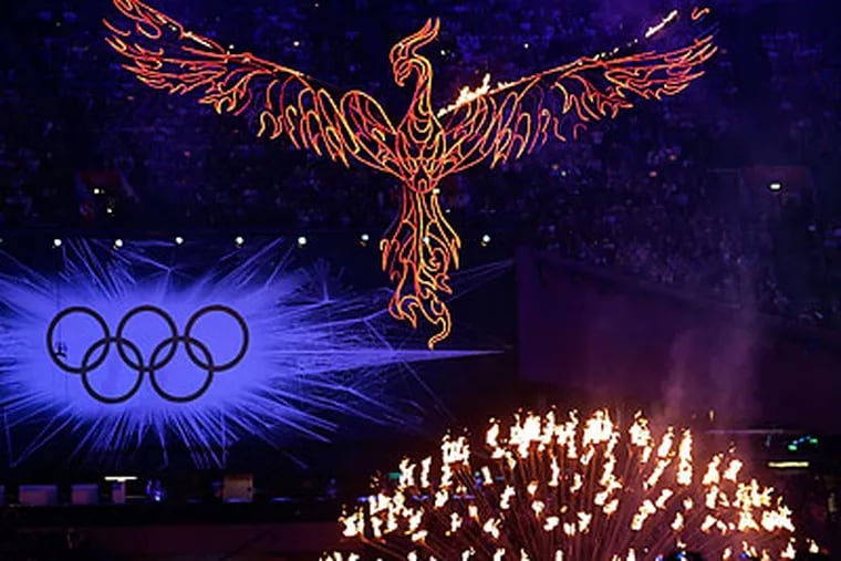 Having been lit up in spectacular fashion, the Olympic flame was  extinguished dramatically as well. (Patrick Semansky/AP)