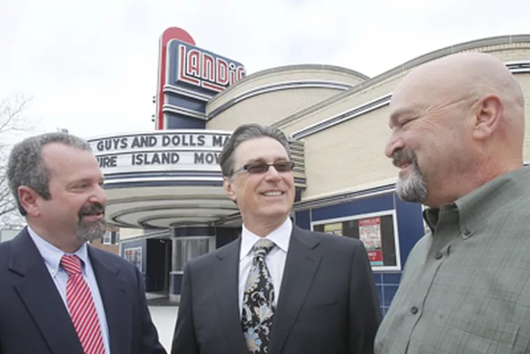In front of the Landis (from left): Mark Packer, Appel executive director; Michael Testa, theater foundation president; and David Manders, Appel trustee president. (Akira Suwa / Staff Photographer)