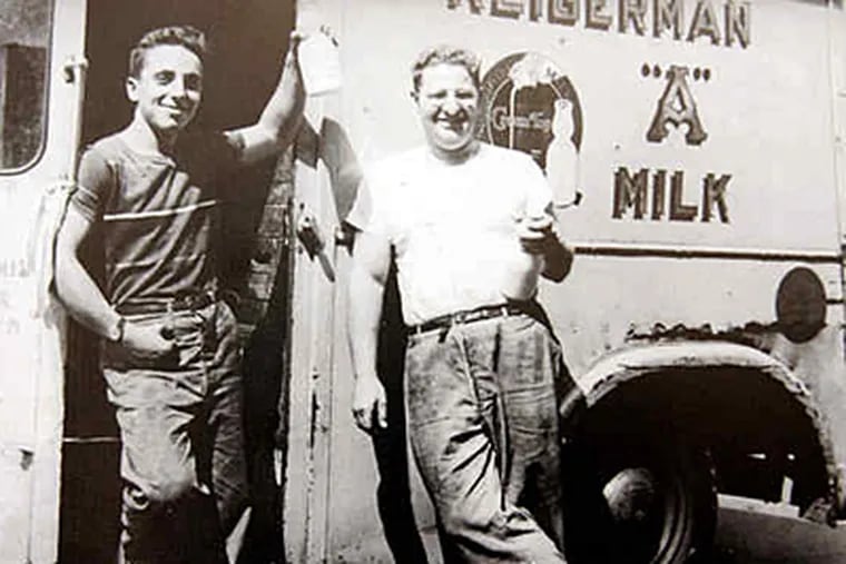 A 1946 photo of cousins Alan and Sam Kligerman leaning on a milk truck from Kligerman's Dairy.