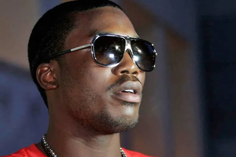 Rapper Meek Mills is seen at the 2Pac 40th Birthday Concert Celebration on Thursday, June 16, 2011, in Atlanta. (AP Photo/ Ron Harris)