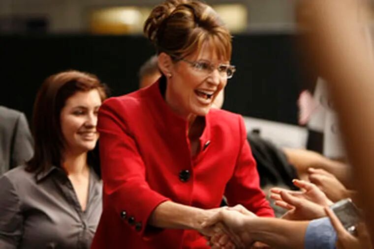 Alaska Gov. Sarah Palin greets supporters at a Columbus, Ohio, rally with her running mate, Arizona Sen. John McCain. Yesterday evening, they were back on CBS&#0039;s news broadcast, facing questions from Katie Couric.