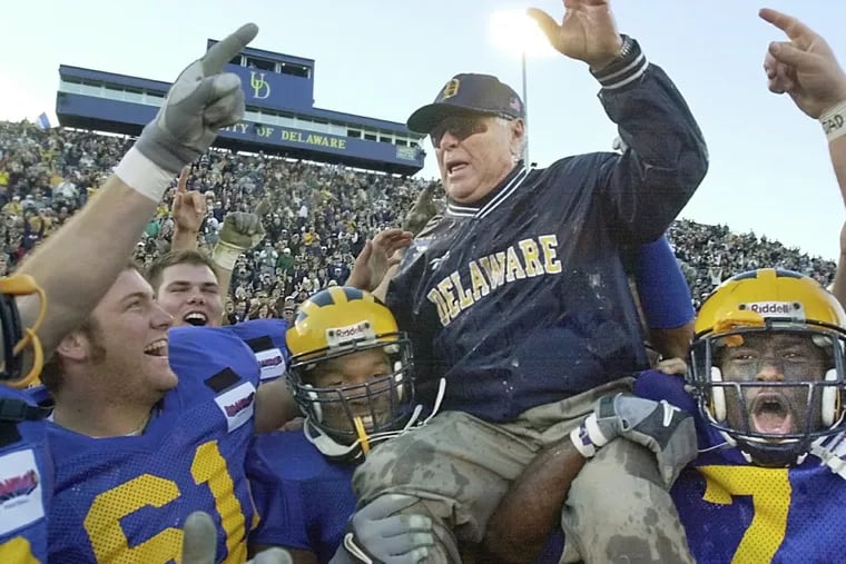 Delaware coach Tubby Raymond is hoisted onto the shoulders of his players after becoming the ninth college football coach to reach 300 wins, after Delaware beat Richmond 10-6 in Newark, Del., Saturday, Nov. 10, 2001.