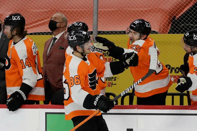 Flyers left wing Joel Farabee celebrates his third period goal with teammate James van Riemsdyk against the New Jersey Devils on Monday, May 10, 2021.  Farabee scored his 20th goal of the season.