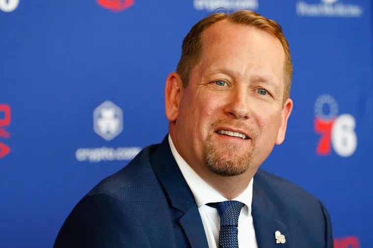 New Sixers coach Nick Nurse smiles while listening to questions at the team's practice facility in Camden.