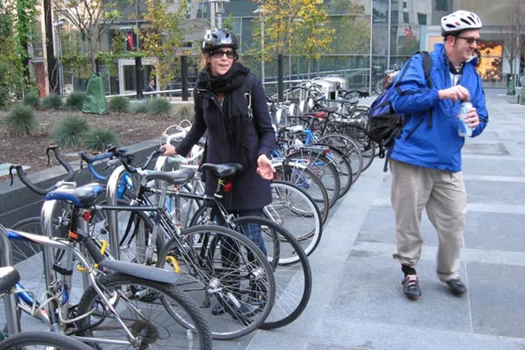 Gary Stewart, a software developer at Comcast, rode his bike nearly 7 miles from Lansdowne on Nov. 4, 2009, because of the SEPTA strike. Marketing strategist Stephanie Singer usually bikes to work, but says the jammed streets made the city a bit less bike-friendly.