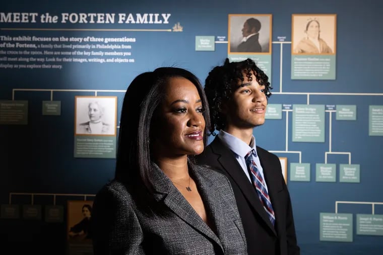 Karla Trotman joined the board of the Museum of the American Revolution after her son, Bryce, became fascinated with the American Revolution. While working on the Black Founders Exhibition Committee about James Forten, Trotman  learned of her own family's connections to Forten. Karla and Bryce, now 15, are shown at the exhibit on  Nov. 14, 2023.