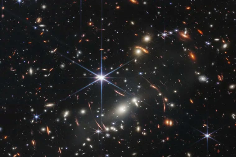 This image provided by NASA shows galaxy cluster SMACS 0723, captured by the James Webb Space Telescope. The telescope is designed to peer back so far that scientists can get a glimpse of the dawn of the universe about 13.7 billion years ago and zoom in on closer cosmic objects, even our own solar system, with sharper focus.