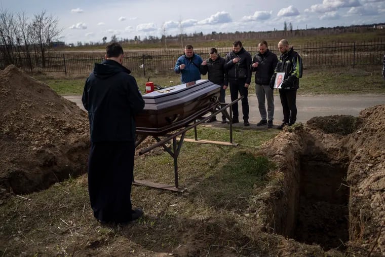 Relatives and friends attending the funeral of Andriy Matviychuk, 37, who served as territorial defense soldier, and was captured and killed by Russian army in Bucha, Ukraine.