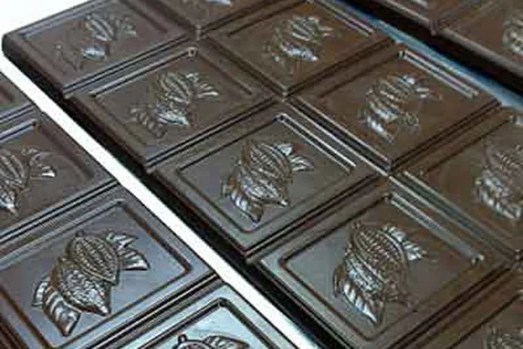 The 72 percent Pure Nacional bars at &#0201;clat, ready for wrapping. The bars are called Good & Evil: The pods contain an uncommon combination of white and dark-purple beans