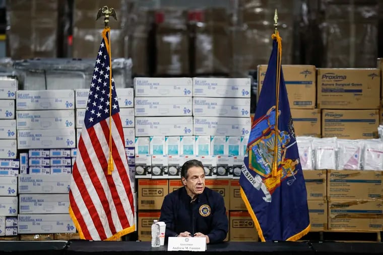 New York Gov. Andrew Cuomo speaking during a March 24 news conference against a backdrop of medical supplies at the Jacob Javits Center that would house a temporary hospital in response to the COVID-19 outbreak in New York.