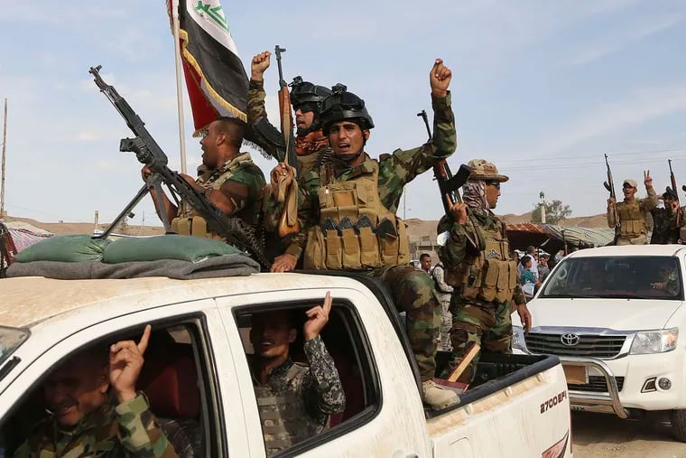 Sunni volunteers on their way to support Iraqi forces in the battle to retake Ramadi from the Islamic State. Estimates of ISIS's troop strength range up to 80,000, but, the author says, they are poorly armed and have succeeded against mostly weak foes.