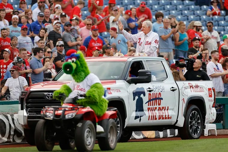 Former Phillies pitcher Ron Reed waves to fans during a victory lap around Citizens Bank Park after Reed was inducted into the team's Wall of Fame.