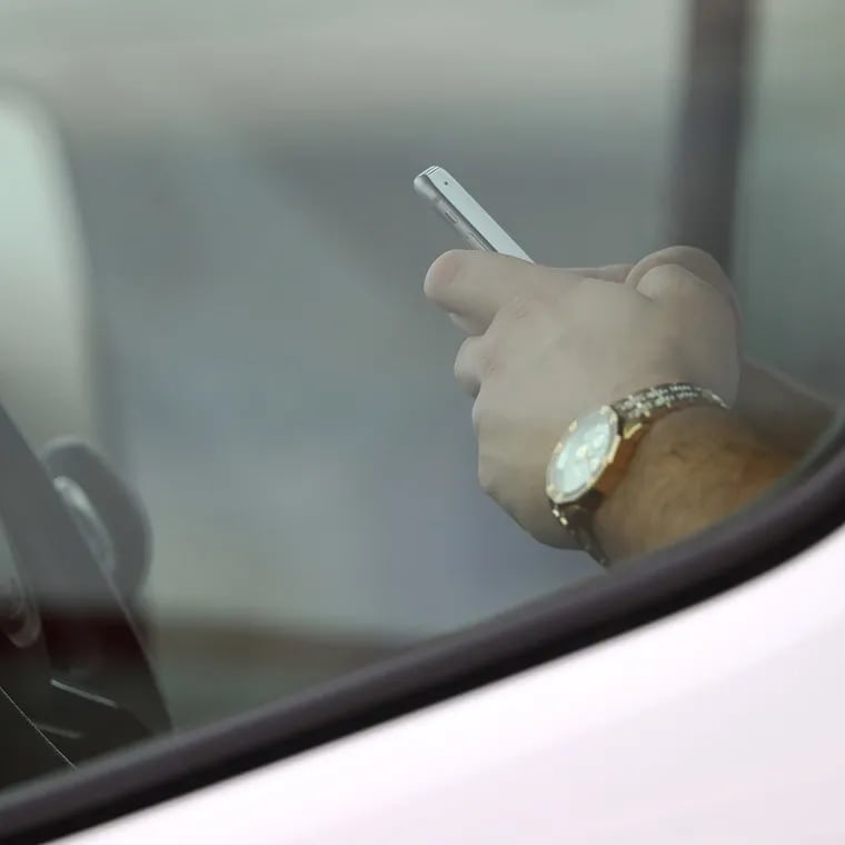 A motorist writes a text message while waiting at a red light at the intersection of Western and Diversey avenues Thursday, March 29, 2019, in Chicago, Ill. Nationwide, 3,166 people died from distracted driving nationally in 2017, according to federal data. 

(John J. Kim/Chicago Tribune/TNS)