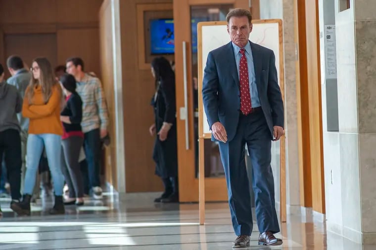 Attorney A. Charles Peruto Jr., who is representing Sean Kratz, leaves the courtroom during a break in deliberations on murder charges Thursday. The jurors were unable to reach a verdict after 14 hours of deliberation.