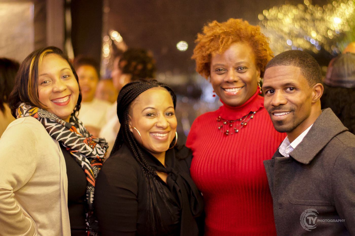 From left to right, Kevana Nixon, Tasnim Sulaiman, Ann Colley and Ryan Mcmillan, who worked together to develop Black Men Heal in its first stages, at the group's December 2018 provider appreciation event at Manayunk Brewing Company.