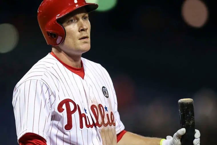 STEVEN M. FALK / STAFF PHOTOGRAPHER Cody Asche says he is trying to work on his swing, even as he sits while struggling at the plate.