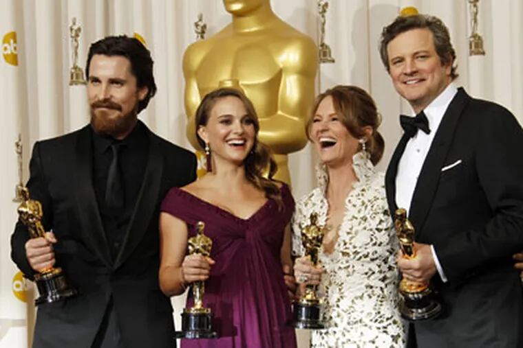 From left, Christian Bale, Natalie Portman, Melissa Leo and Colin Firth pose backstage with their Oscars on Sunday (AP Photo/Matt Sayles)