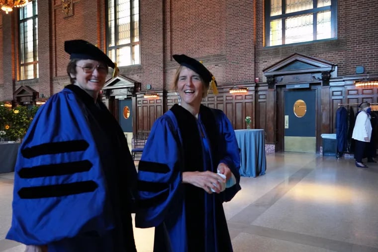 Jean Bennett, right, a professor emeritus of ophthalmology at the University of Pennsylvania, with Nobel Prize winner Katalin Kariko when they received honorary degrees from Yale University in 2022.