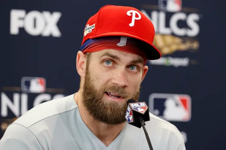 Bryce Harper meets with the media before working out at Petco Park on Monday.