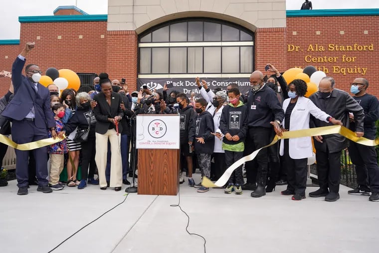 Ala Stanford cuts the ribbon at the Black Doctors COVID-19 Consortium's Dr. Ala Stanford Center for Health Equity in North Philadelphia on Wednesday.