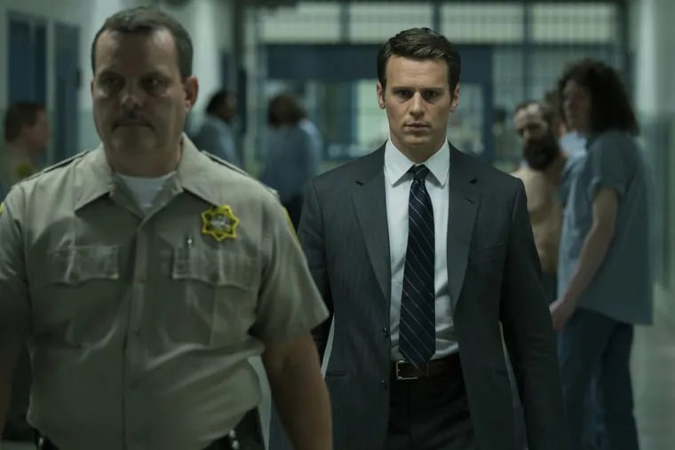 Jonathan Groff (right) plays FBI profiler Holden Ford in Netflix’s “Mindhunter.”