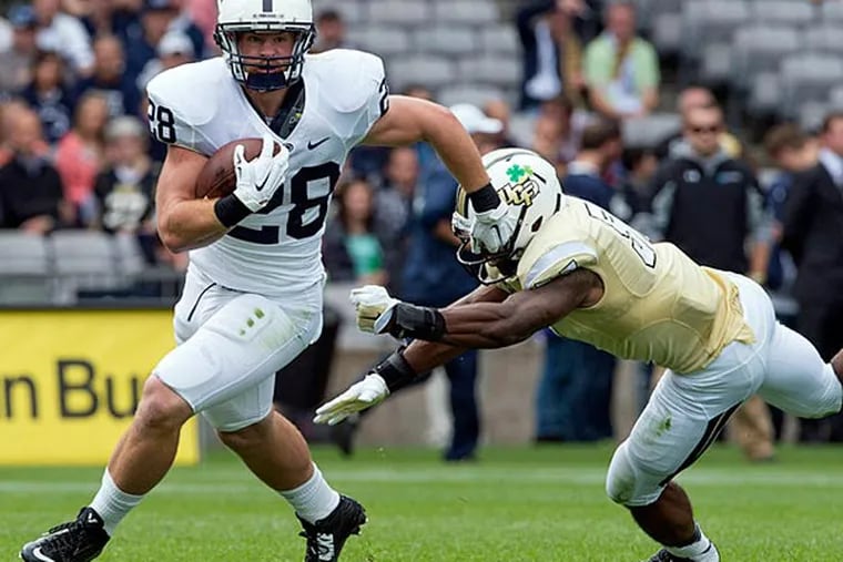 Penn State Nittany Lions Zach Zwinak (28) scrambles during the first half of the game against the Central Florida Knights at Croke Park. (Steve Flynn/USA Today)