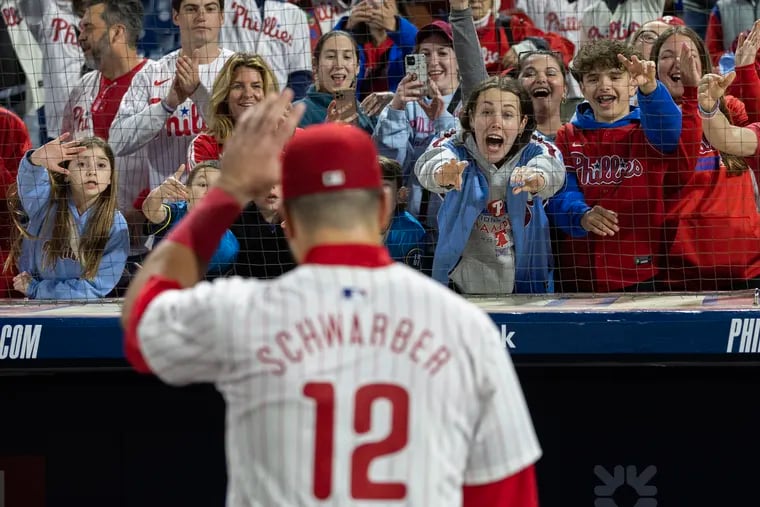Phillies fans react to Kyle Schwarber as he walks off the field after the Phillies 7-6 victory over the Rockies on April 17, 2024 at Citizens Bank Park. Schwarber had two home runs in the game.
