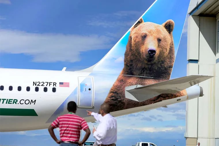 The grizzly bear is among animals painted on the tails of jets flown by Frontier Airlines, which is returning to Philadelphia.