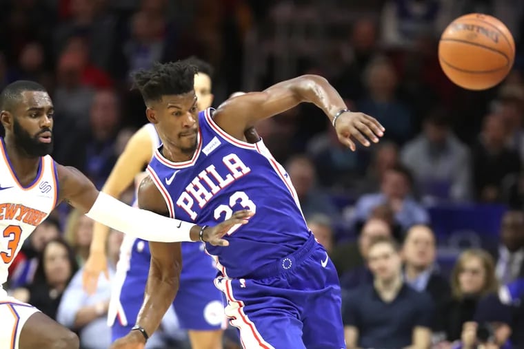 Jimmy Butler, deflects a pass away from Tim Hardaway in the Sixers 117-91 win.