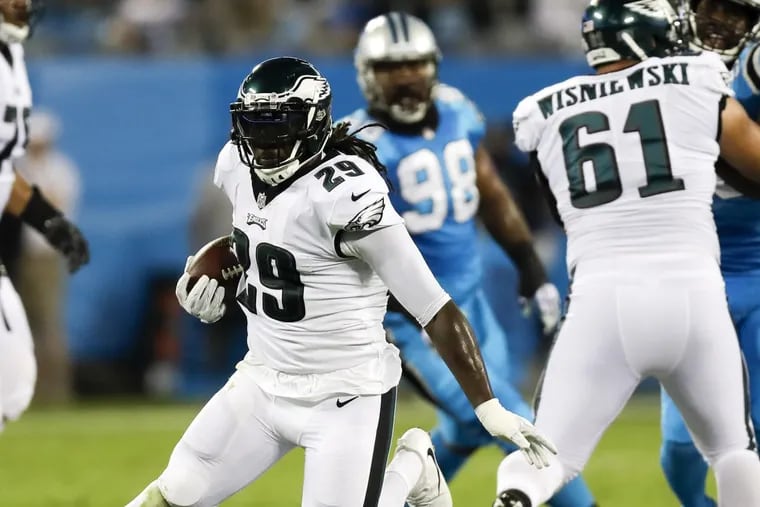 LeGarrette Blount runs with the football against the Carolina Panthers on  Oct. 12.