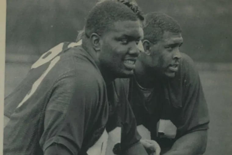 Eagles player Jerome Brown, left, at a practice in Philadelphia.
