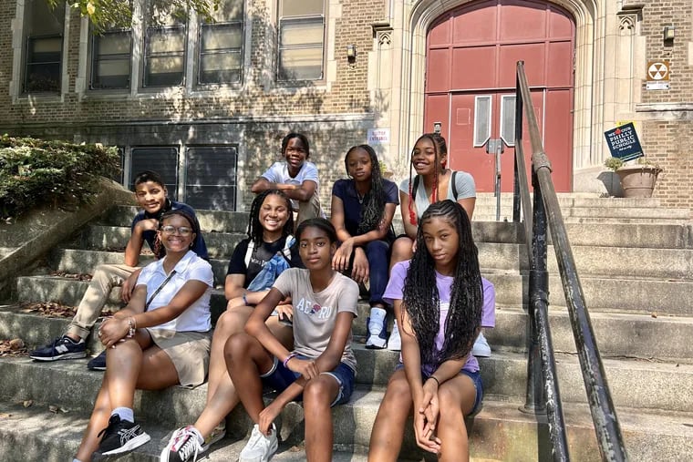 Jenks eighth graders helped lead efforts to combat "White Lives Matter" signs put up in Chestnut Hill around the school with messages of positivity. Pictured outside the school are (back row) Craig Wilson (from left), Lauren Thomas-Kirton, Leanni Miller-Allen, and (front row) Corey Sullivan, Gabriella Alexander, Khayli McKinney, Noelle Smith, and Laila Whitaker.
