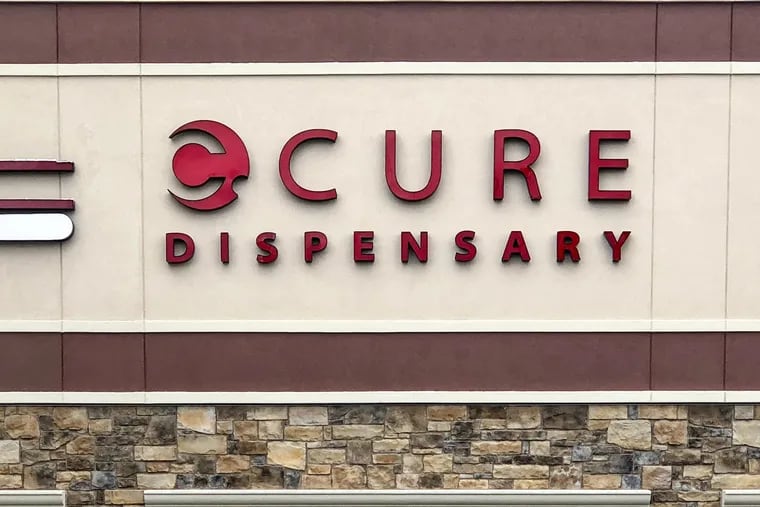 The Cure Pennsylvania storefront at 4502 City Ave.  Cure opens its first Philadelphia medical marijuana dispensary on Friday. The same day, Herbology will cut the ribbon on its first cannabis shop on Passyunk Ave.