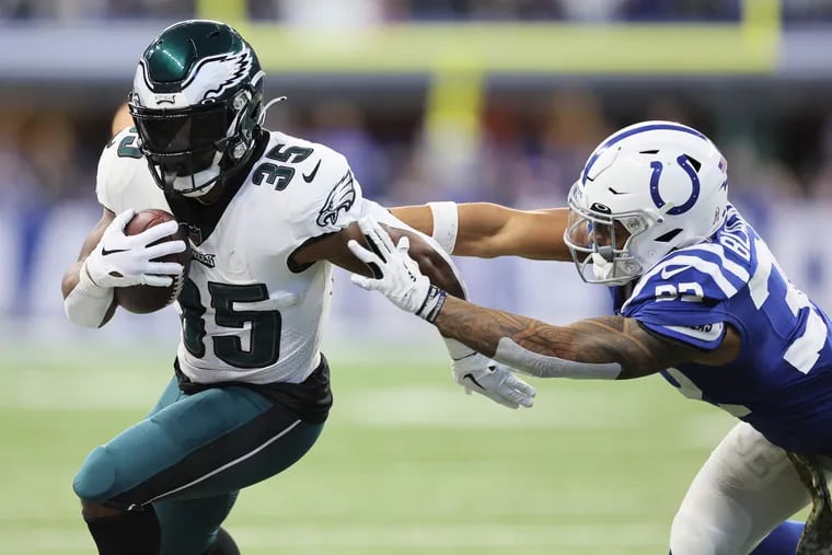 Eagles running back Boston Stott runs away from Colts defensive back Julian Blackmon in last week’s game in Indianapolis. Philadelphia heads into its Sunday night home game against the Packers ranked sixth in the NFL in rushing. (Photo by Andy Lyons/Getty Images)