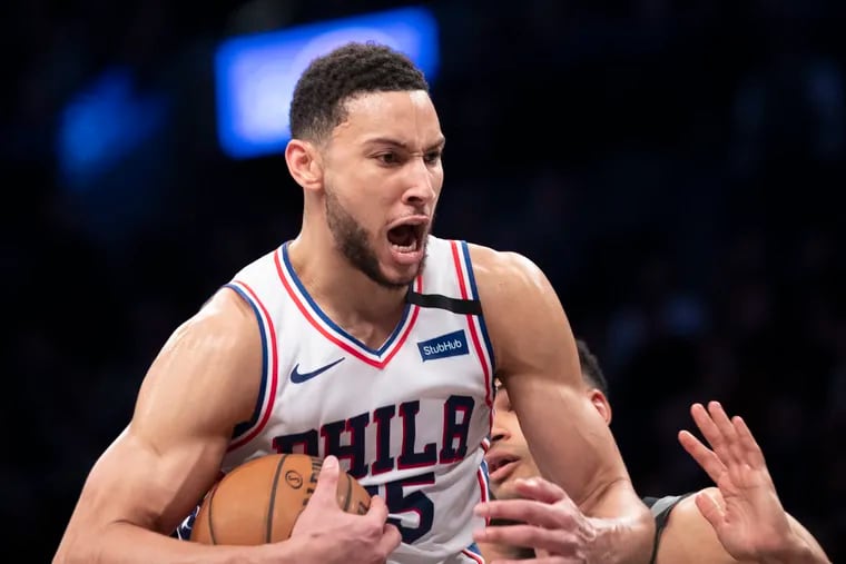 Philadelphia 76ers guard Ben Simmons reacts after grabbing a rebound during the second half of Monday's game against Brooklyn Nets.