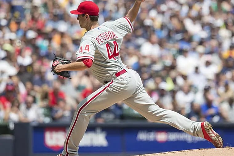 Phillies pitcher Jonathan Pettibone throws to a Brewers batter during the first inning on Sunday, June 9 in Milwaukee. (Tom Lynn/AP)