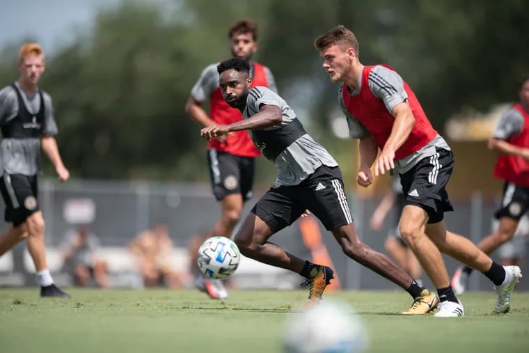 Philadelphia Union midfielder Warren Creavalle (center) working out in a practice session on Friday.
