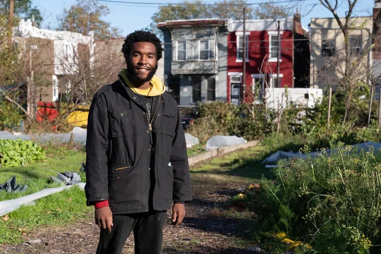 Robert Sonder, 24, director of event management at the Urban Creators farm in North Philadelphia. Working at the site since he was a teenager, Sonder calls the two-acre plot "magical."