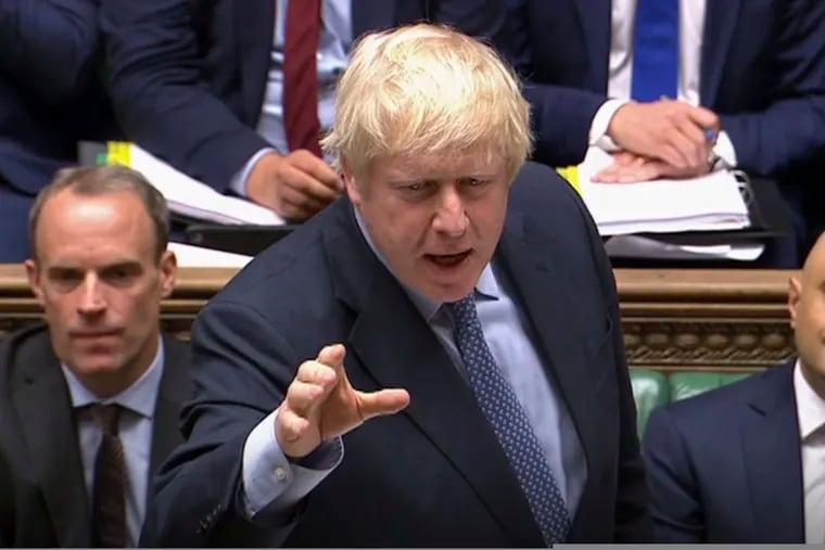 In this image taken from video, Britain's Prime Minister Boris Johnson speaks during Prime Minister's Questions in the House of Commons, London, Wednesday Sept. 4, 2019. (House of Commons via PA via AP)