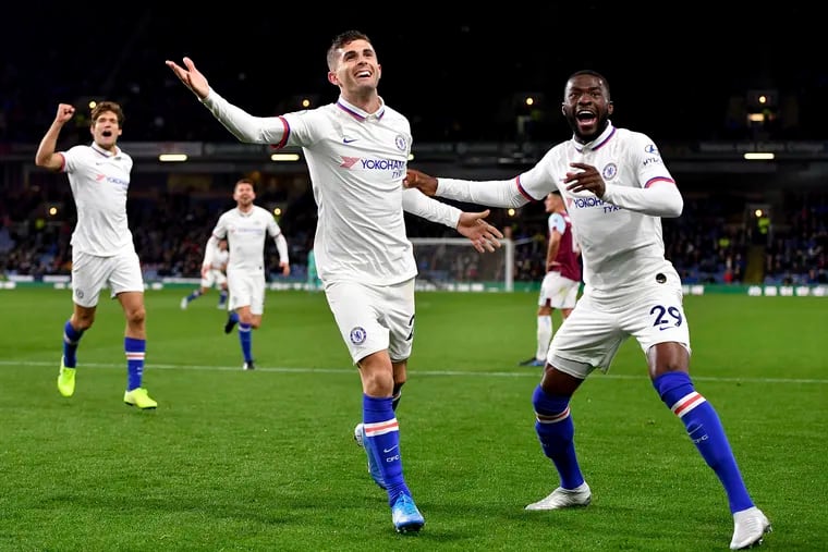 Chelsea's Christian Pulisic (center) celebrates scoring his team's third goal of the game against Burnley.