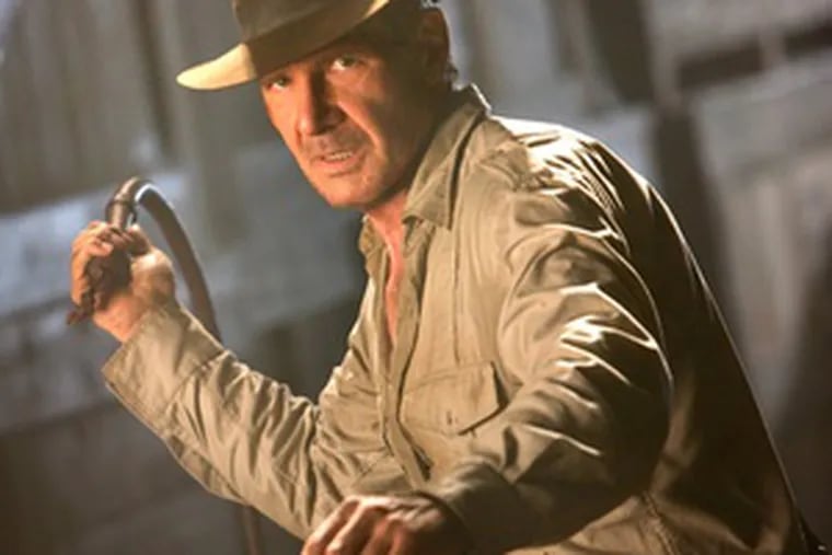 Harrison Ford grabs his hat and whip and embarks on another adventure in &quot;Indiana Jones and the Kingdom of the Crystal Skull.&quot; This time it&#0039;s 1957.