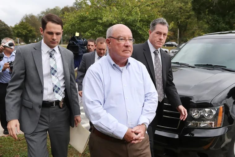 File photo: Radnor Township Commissioner Philip Ahr is shown in October 2017 walking to his arraignment in Newtown Square on state charges of child sexual abuse and distributing and possessing child pornography.