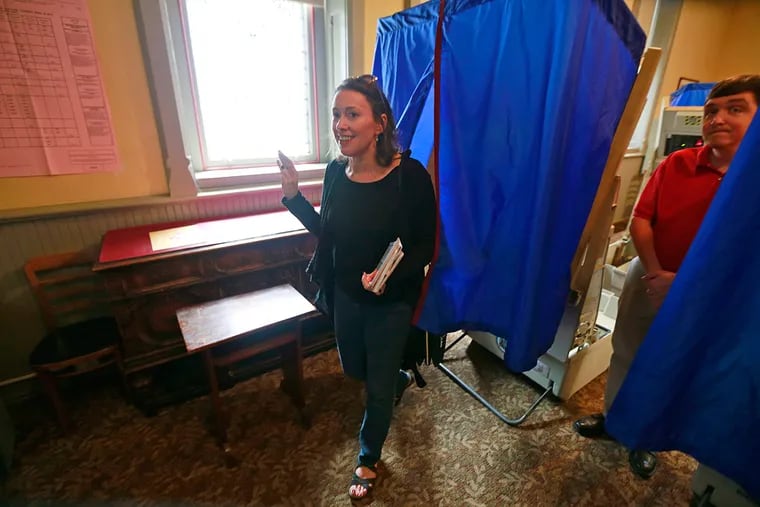 Margie Foley, 46, of Philadelphia, votes at Trinity Memorial Episcopal Church.
