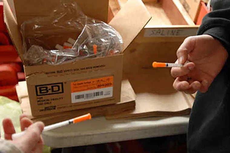 Only Philadelphia and Pittsburgh have needle-exchange programs in Pennsylvania. The ability for addicts now to get needles at a pharmacy without a prescription is expected to make the most difference in suburban areas and the state's vast rural middle.  (Ron Tarver / Staff)