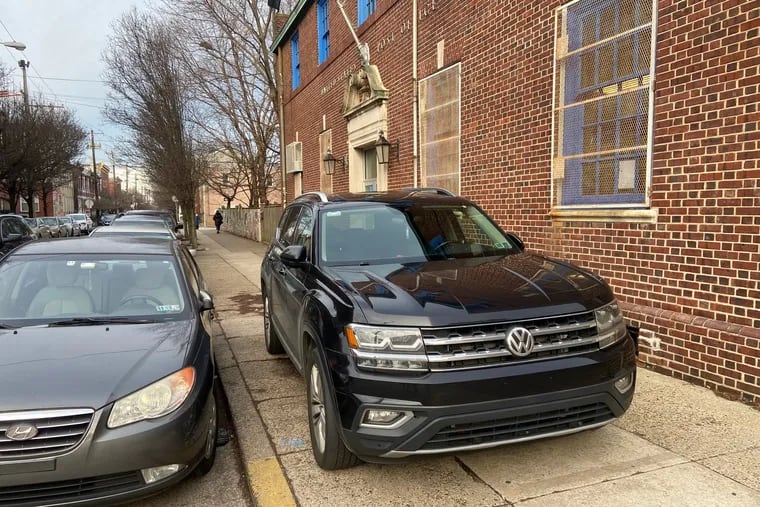 Vehicle parked on the sidewalk on the 900 block of Dickinson Street in January, blocking path to the post office.