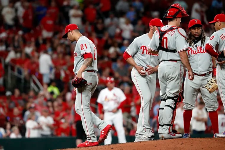 Phillies pitcher Vince Velasquez (left) is being encouraged to do less thinking, and more pitching when catcher JT Realmuto makes a call.
